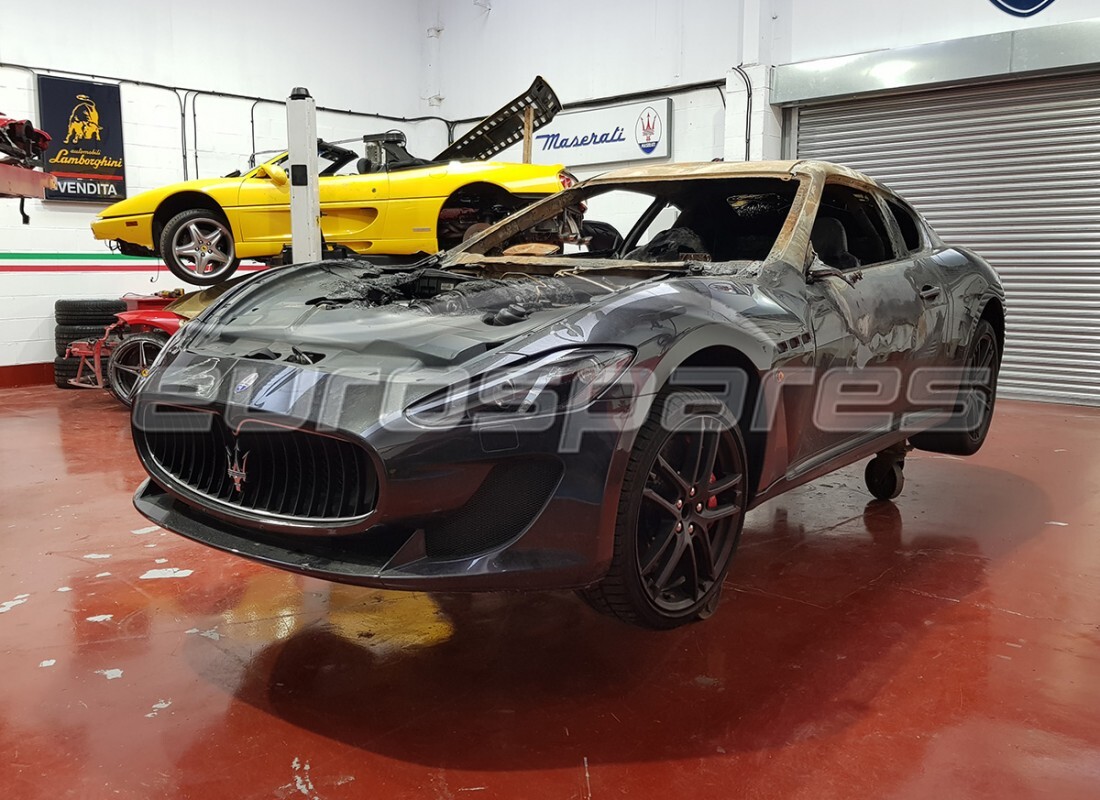 Maserati Granturismo MC Stradale (2011) getting ready to be stripped for parts at Eurospares