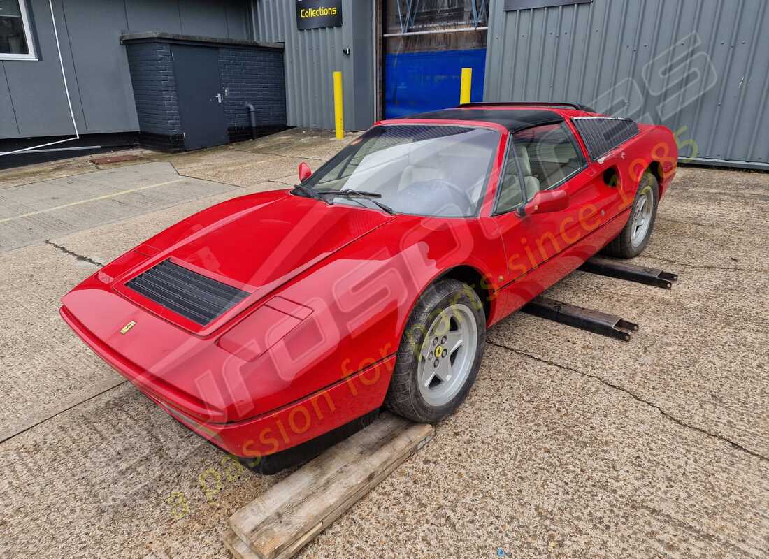 Ferrari 328 (1985) getting ready to be stripped for parts at Eurospares