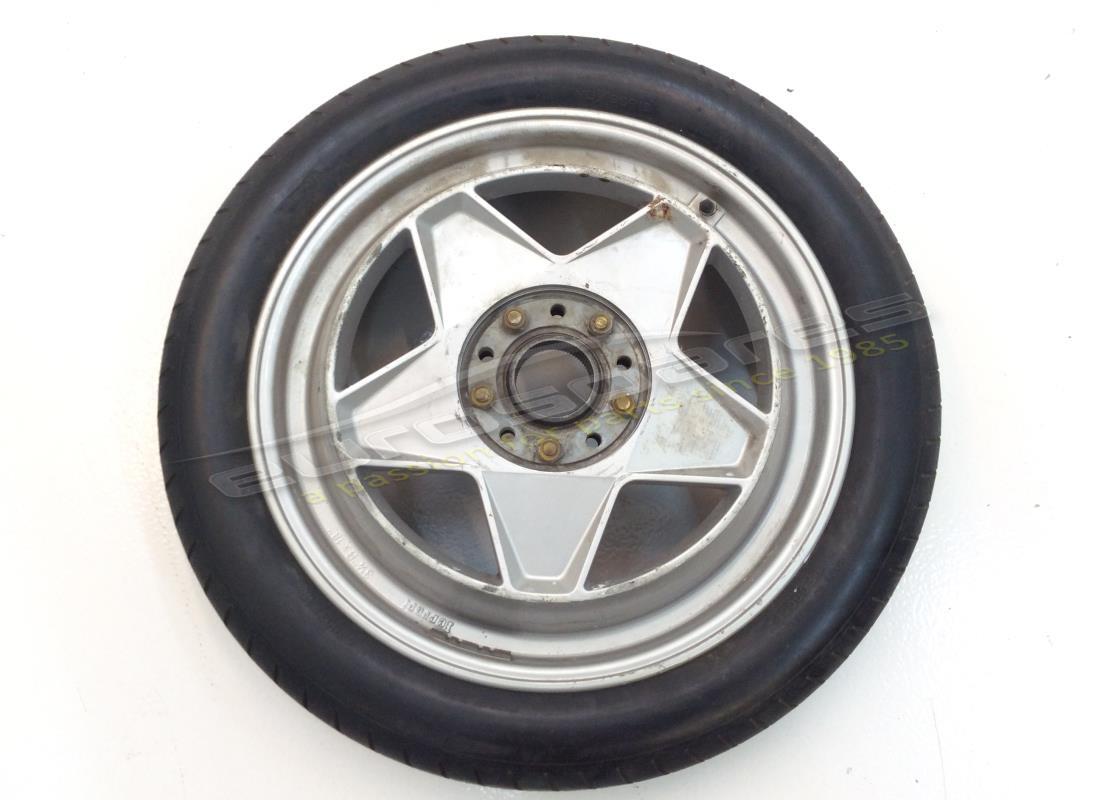 used ferrari spare tyre rim 3v4 b x 18. part number 124184 (1)