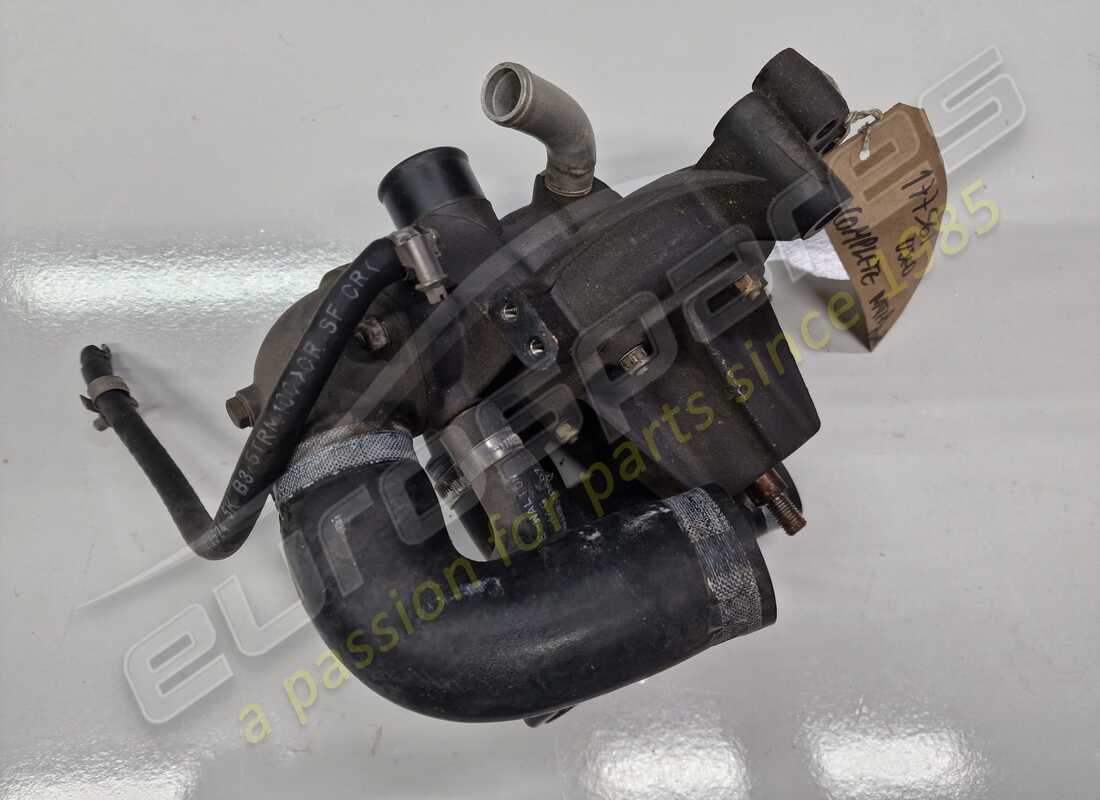 used ferrari complete water pump (order individual parts). part number 177561 (1)