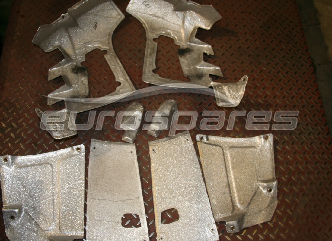 used ferrari rear bumper heat shield kit. part number 85703200 (1)