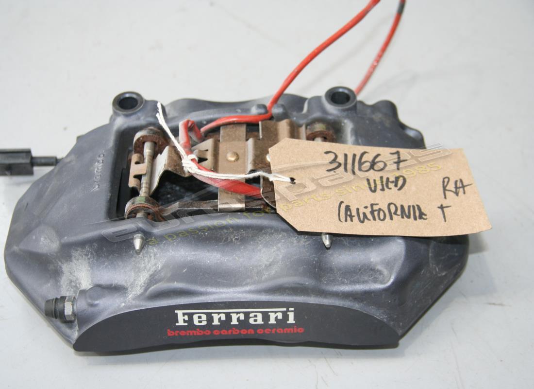 used ferrari rear rh caliper with pads. part number 311667 (1)