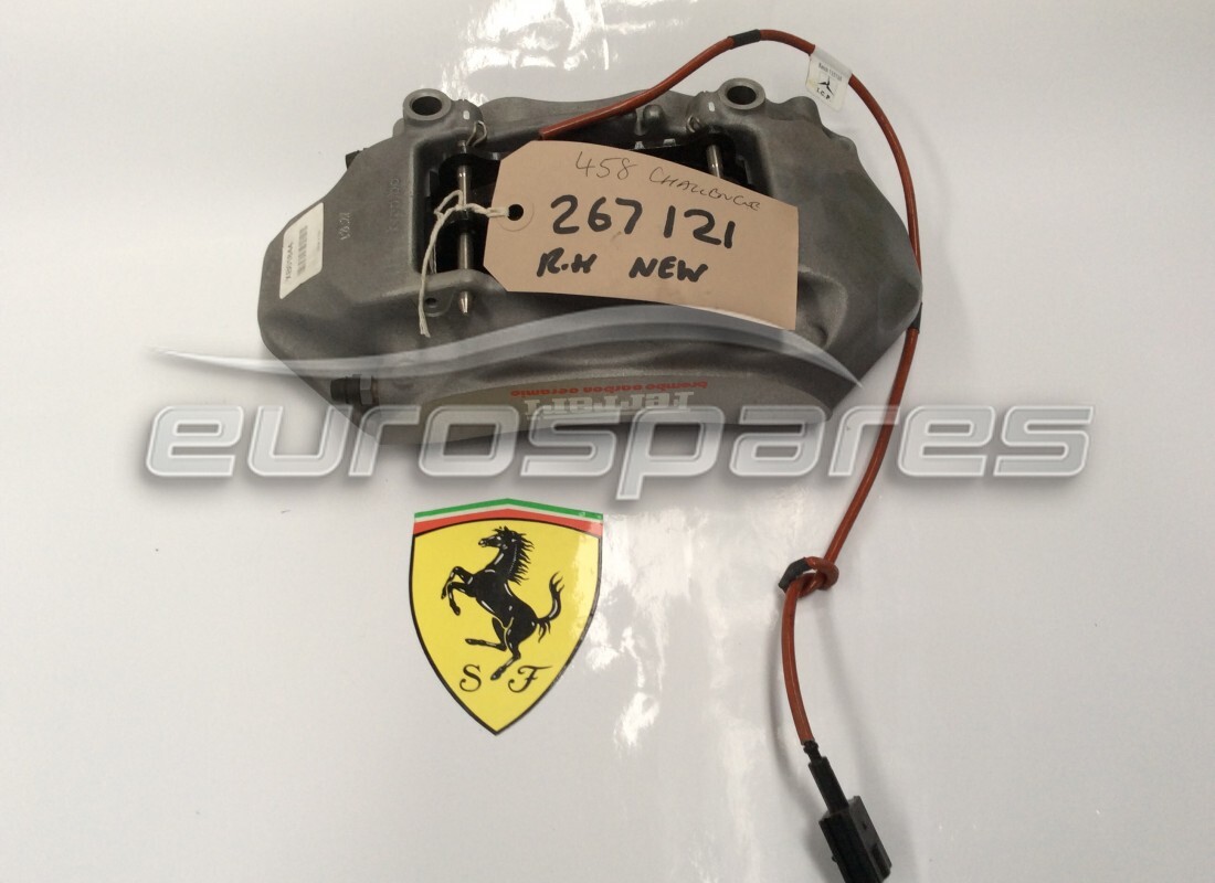 new ferrari rear rh caliper with pads. part number 267121 (1)