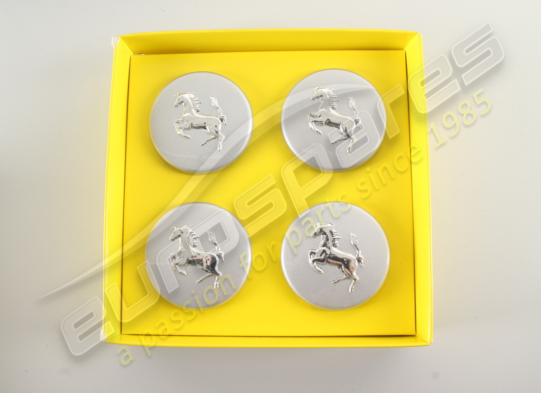 new ferrari wheel centre cap kit (silver). part number 70001467 (1)