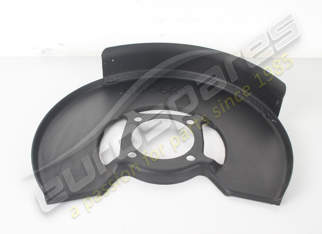 NEW FERRARI RH DISC COVER. PART NUMBER 680662 (2) new ferrari rh disc cover. part number 680662 (2)