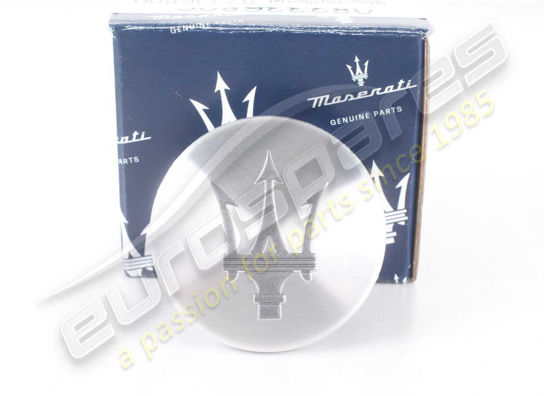 NEW MASERATI WHEEL BADGE - SILVER/GREY. PART NUMBER 82336806 (1) new maserati wheel badge - silver/grey. part number 82336806 (1)