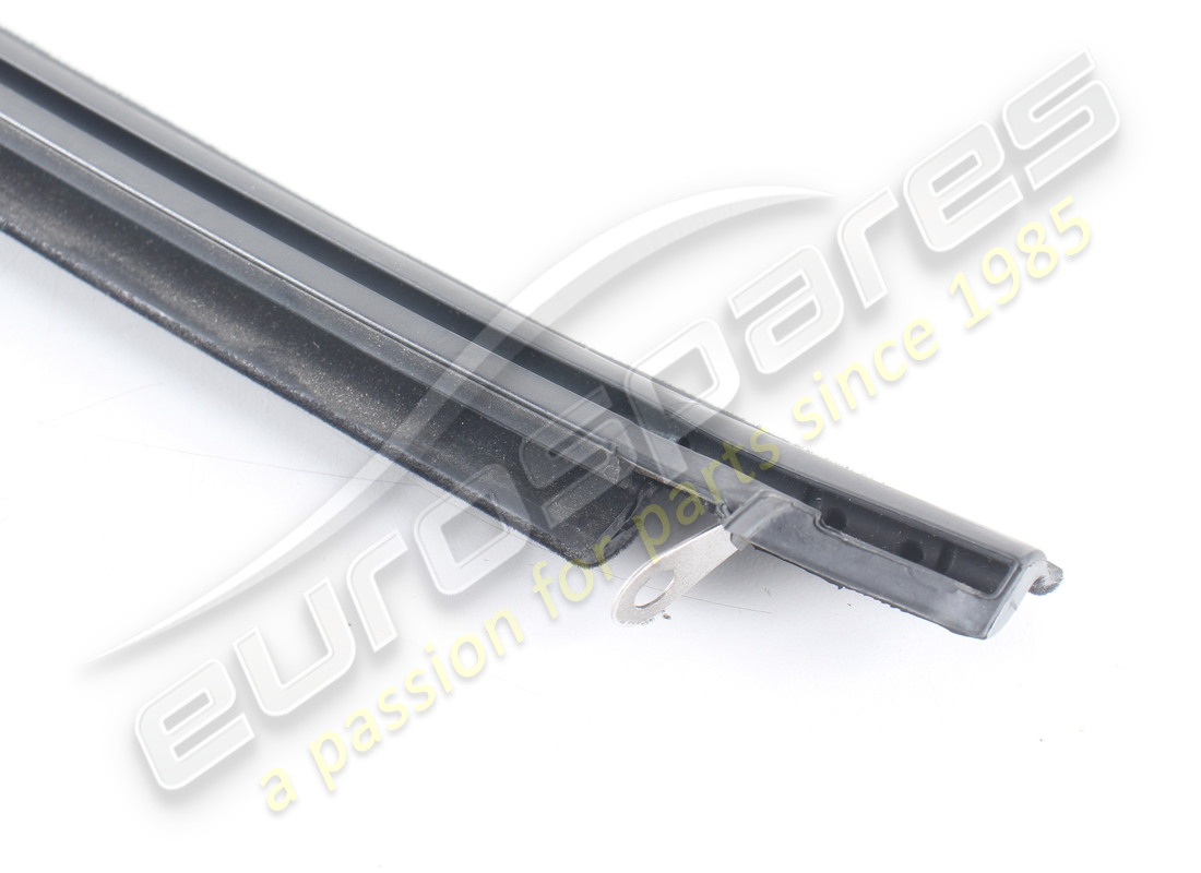 new (other) ferrari lh outer glass scraper. part number 67129500 (3)