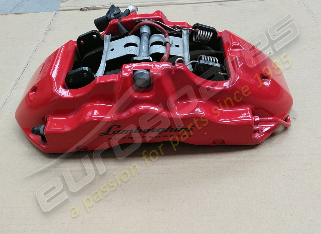 used lamborghini front caliper in red part number 4t0615105df