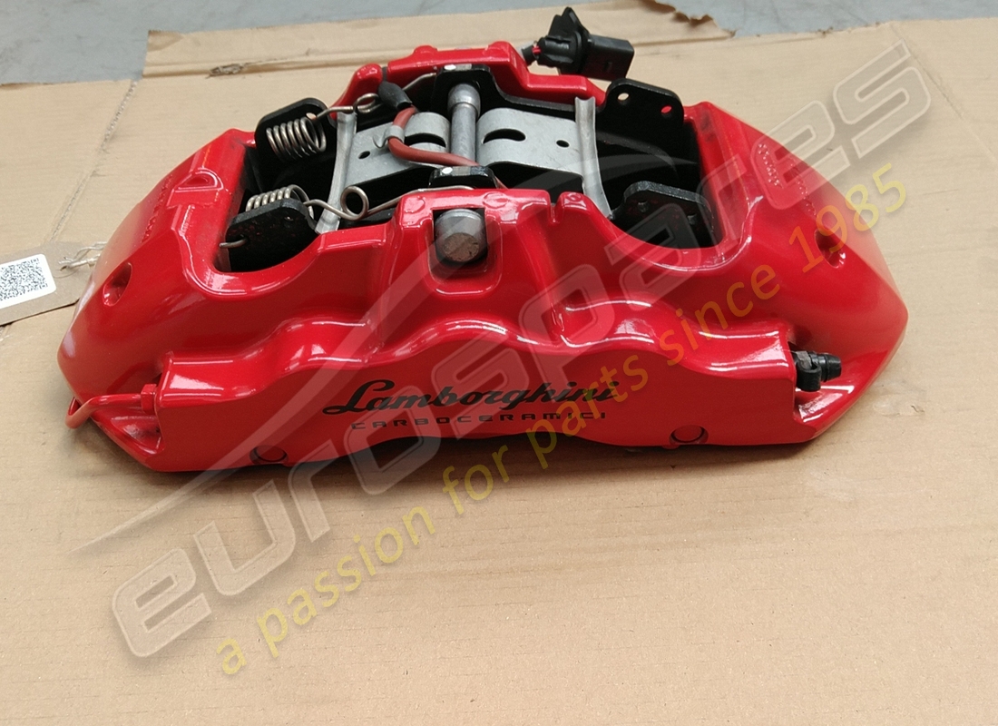 used lamborghini front caliper in red part number 4t0615106df