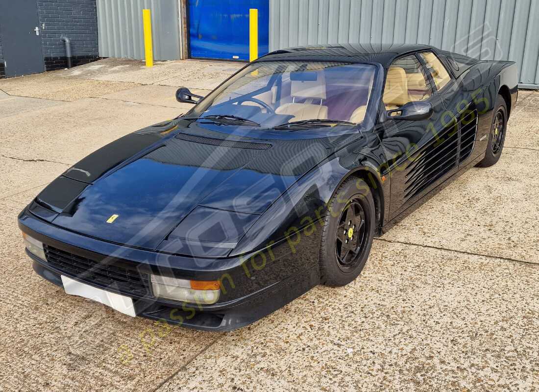 ferrari testarossa (1990) being prepared for dismantling at eurospares