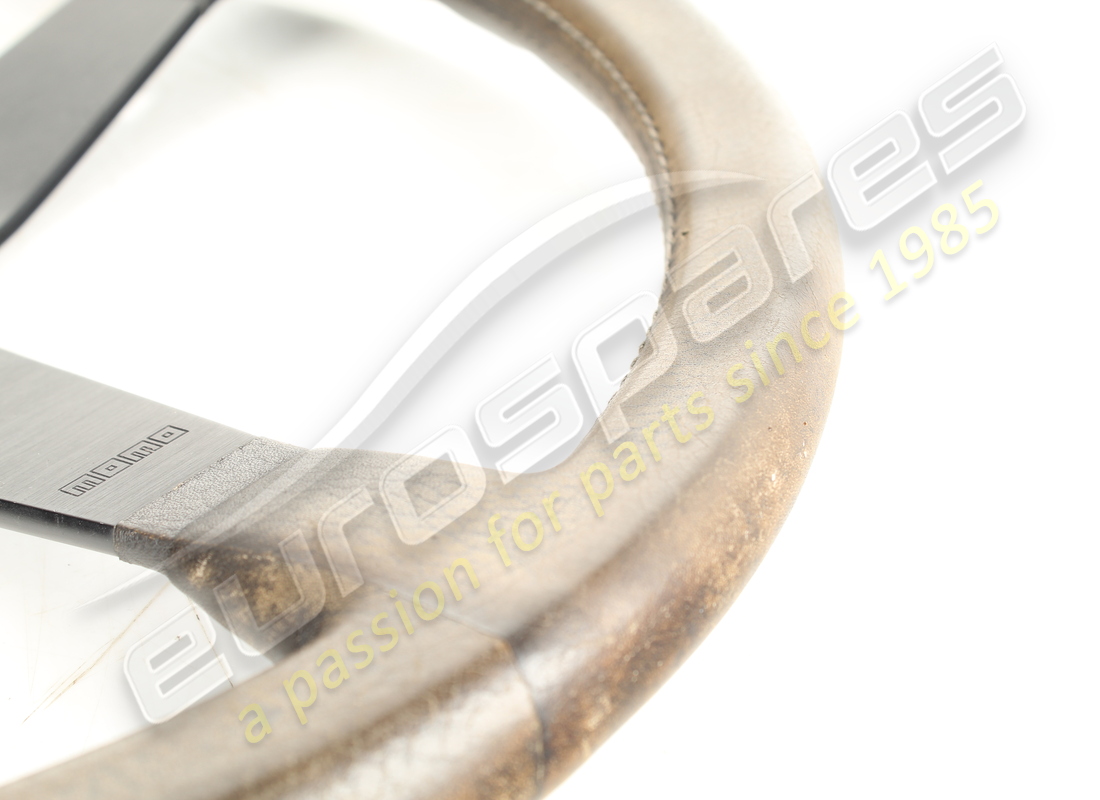 USED FERRARI MOMO BLACK STEERING WHEEL ONLY. PART NUMBER 119038 (4) used ferrari momo black steering wheel only. part number 119038 (4)