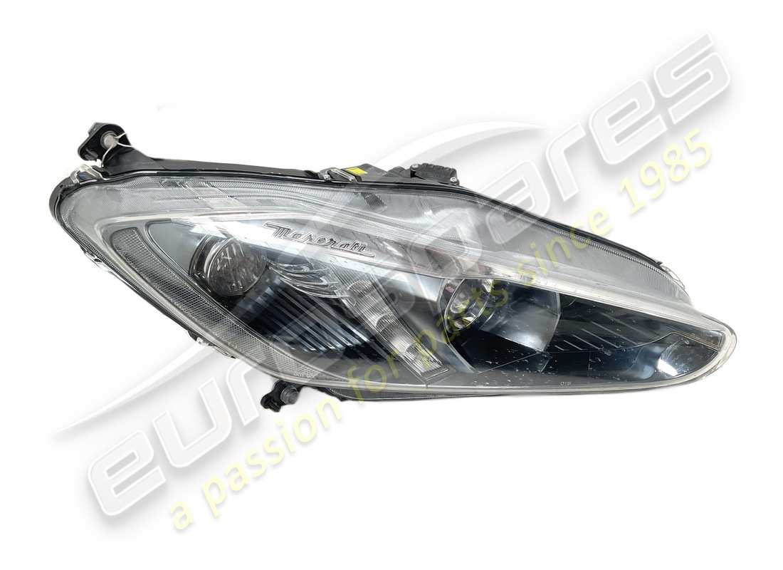 used maserati rh front headlight. part number 350565 (1)