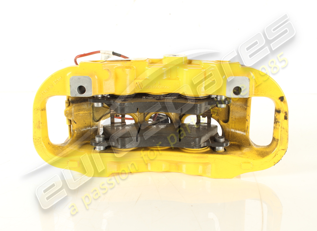 used ferrari front lh caliper with pads. part number 322140 (3)