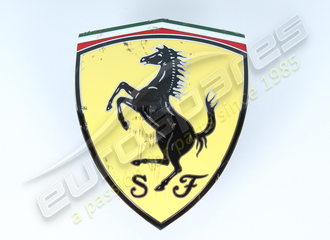damaged ferrari squadra corse shield badge. part number 88954300 (1)