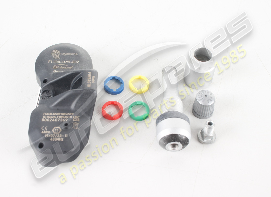 new aston martin transmitter/valve and ring set (1 wheel). part number cg33360671aa (1)