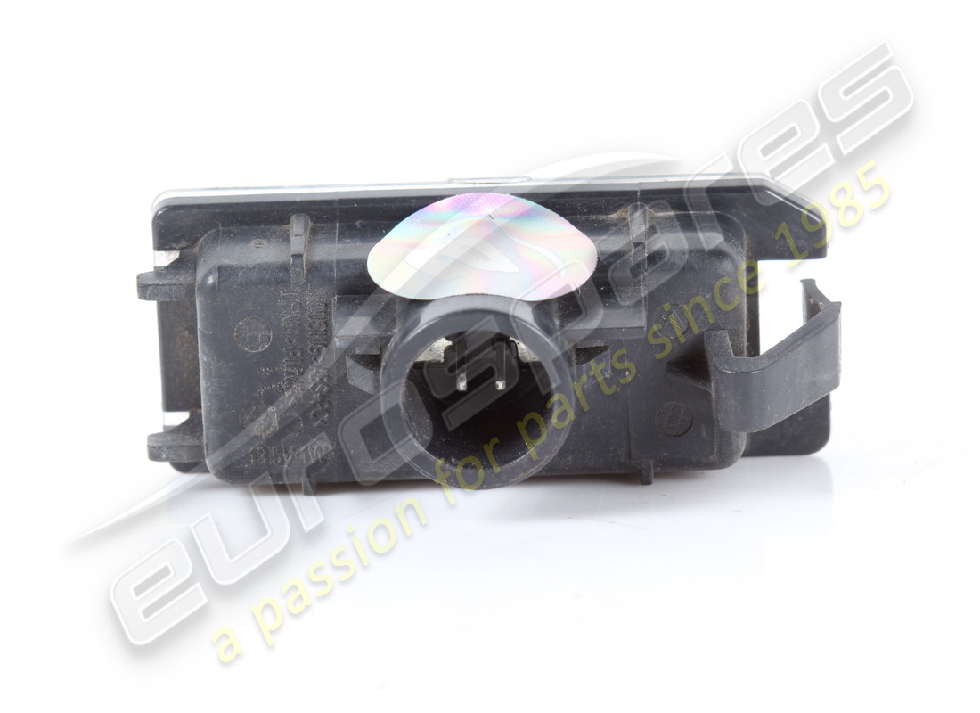 USED FERRARI LICENSE PLATE LIGHT/PUDDLE LAMP. PART NUMBER 318015 (4) used ferrari license plate light/puddle lamp. part number 318015 (4)