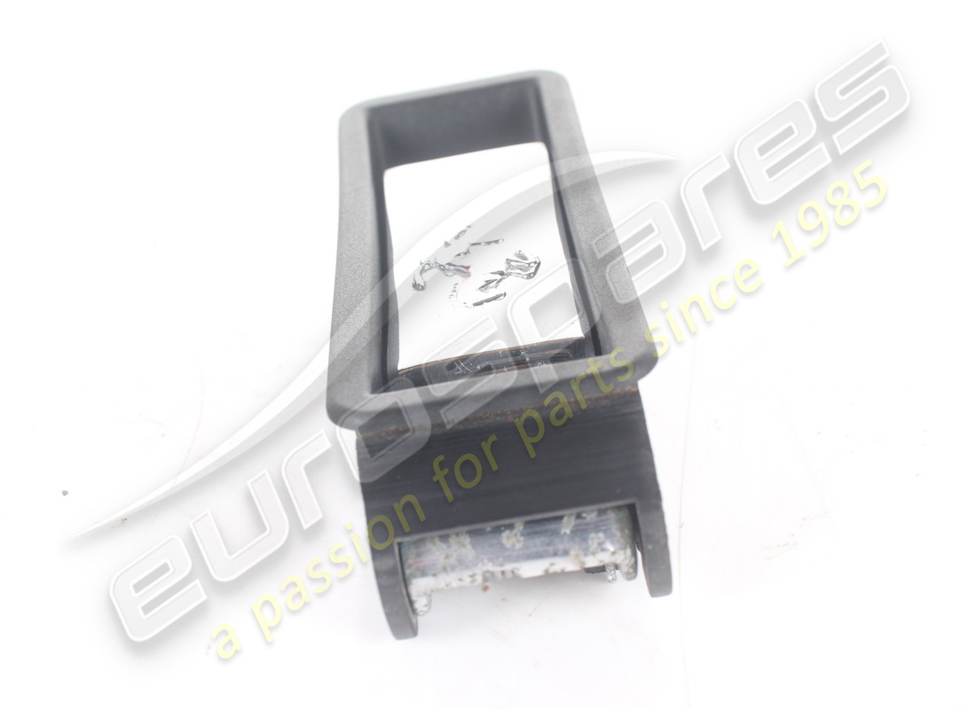 DAMAGED FERRARI INTERNAL BOOT RELEASE HANDLE (EMBOSSED HORSE MOTIF). PART NUMBER 63011800 (5) damaged ferrari internal boot release handle (embossed horse motif). part number 63011800 (5)