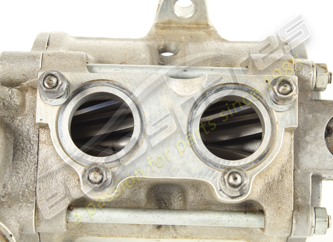 USED FERRARI RECOVERY PUMP BODY WITH STUD BOLTS. PART NUMBER 143276 (3) used ferrari recovery pump body with stud bolts. part number 143276 (3)
