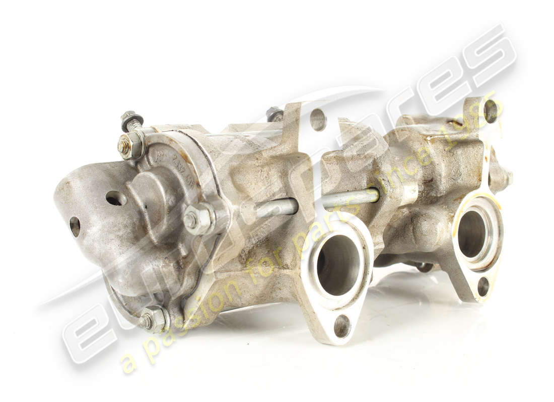 USED FERRARI RECOVERY PUMP BODY WITH STUD BOLTS. PART NUMBER 143276 (7) used ferrari recovery pump body with stud bolts. part number 143276 (7)