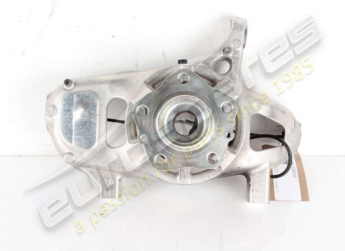 used ferrari complete lh front hub carrier. part number 328039 (1)