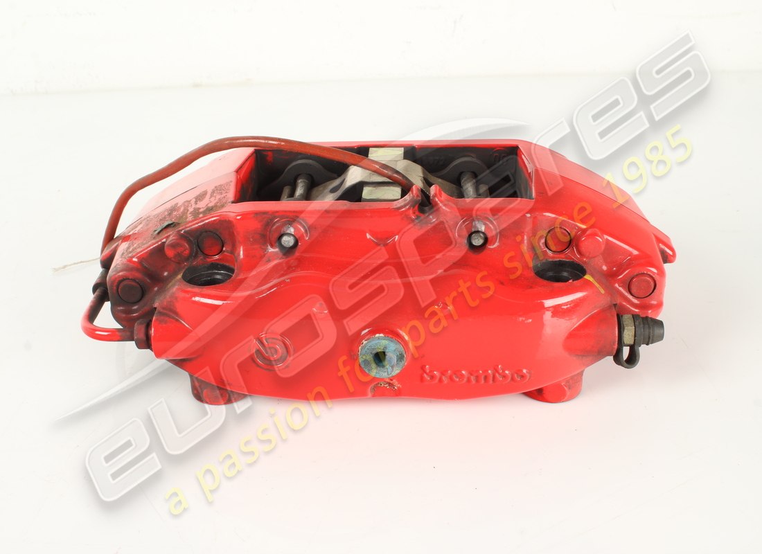 used ferrari rh rear caliper unit with pads. part number 228020 (2)