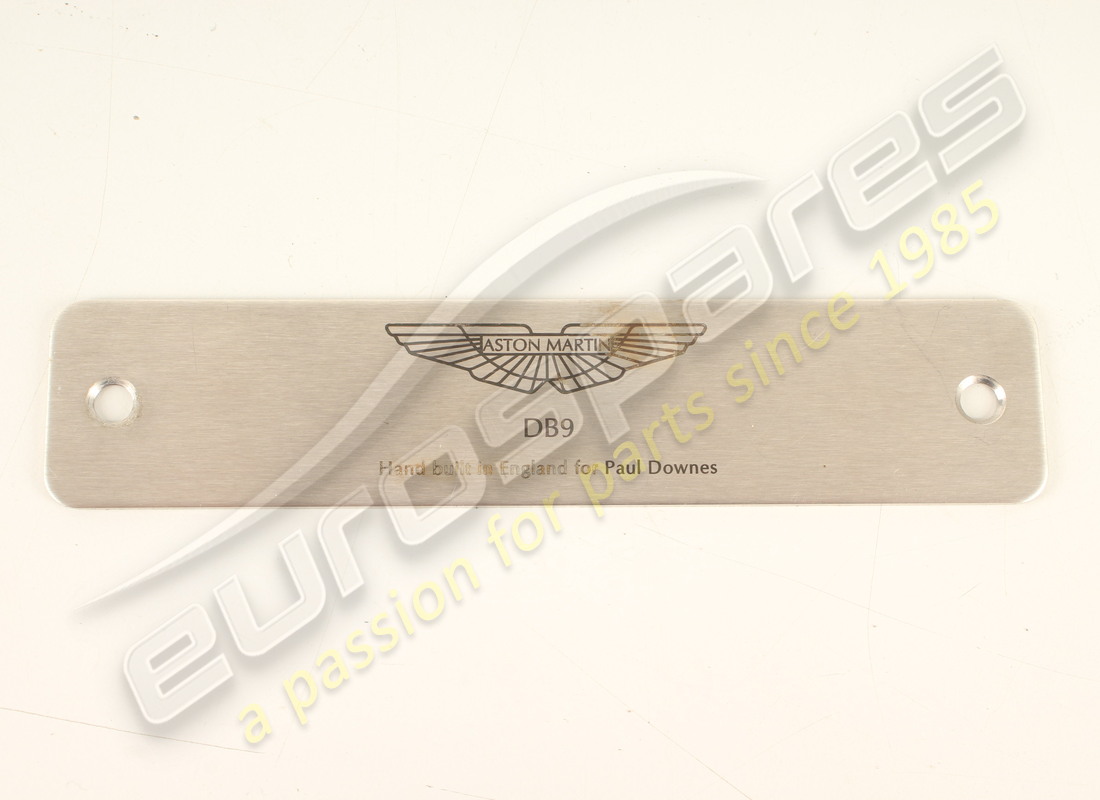 used aston martin name plate, front, standard, am wings. part number 4g438010787 (1)