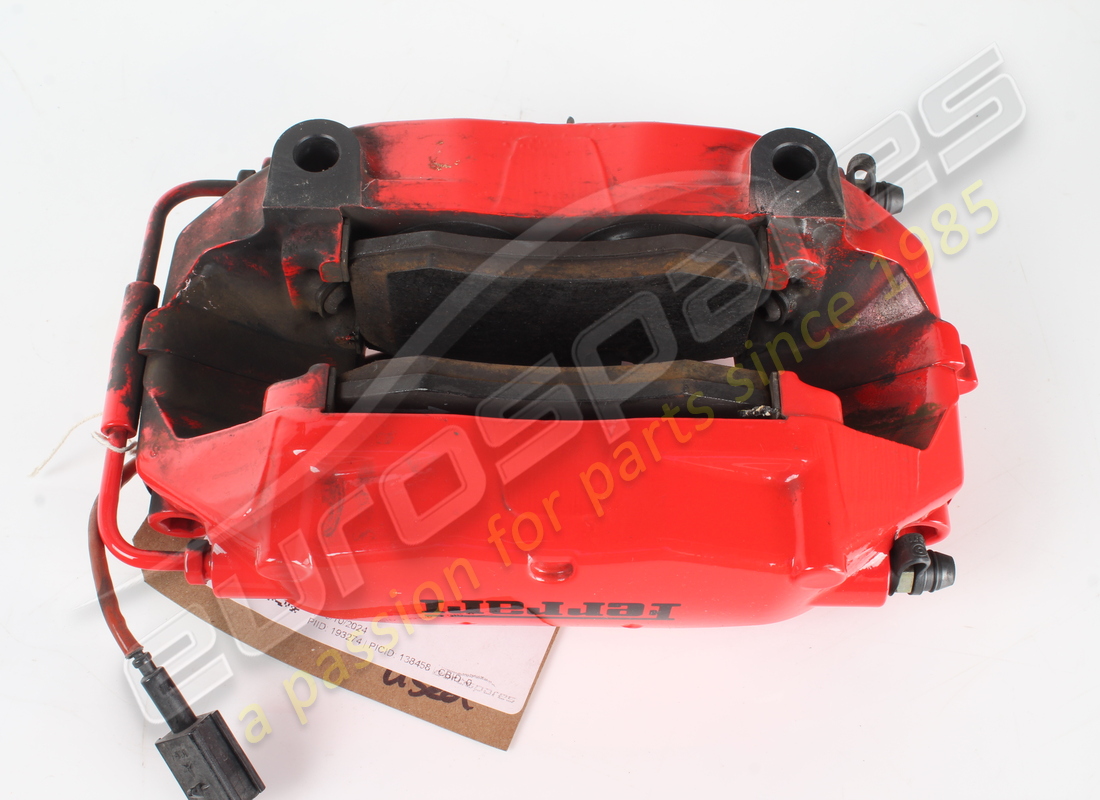 used ferrari rh rear caliper unit with pads. part number 228020 (3)