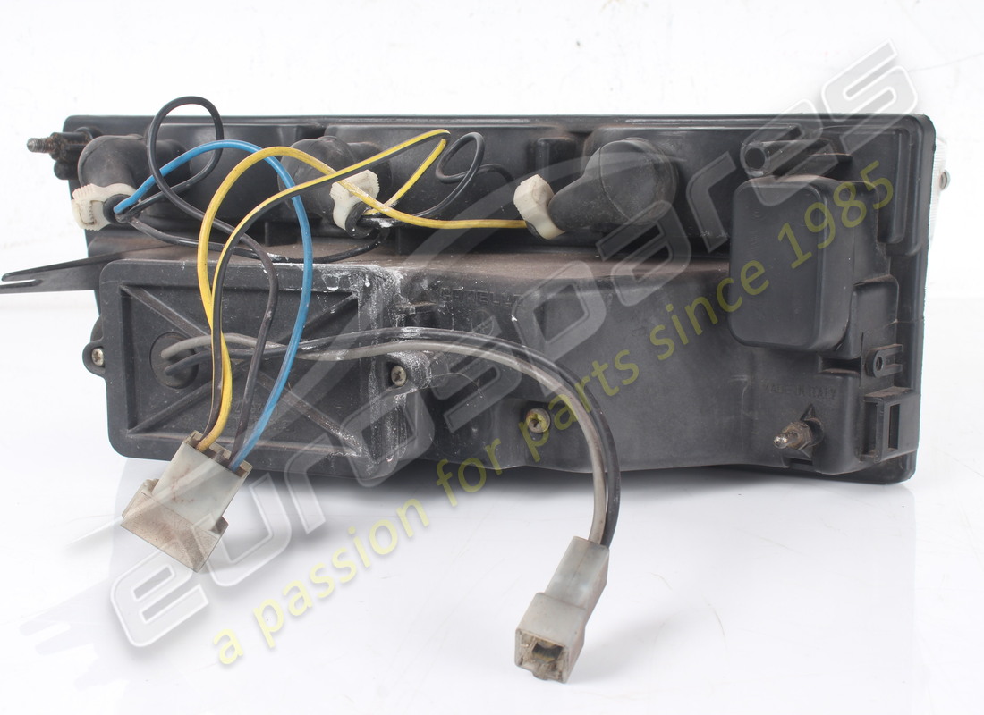 USED FERRARI LH FRONT LIGHT COMPLETE RHD PART NUMBER 61882400 (4) used ferrari lh front light complete rhd part number 61882400 (4)