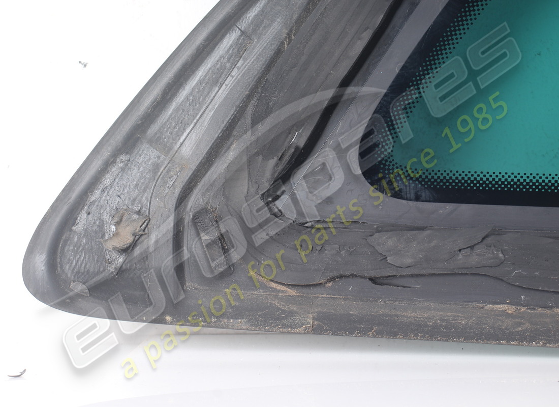 USED FERRARI LH REAR QUARTERLIGHT. PART NUMBER 86871300 (4) used ferrari lh rear quarterlight. part number 86871300 (4)