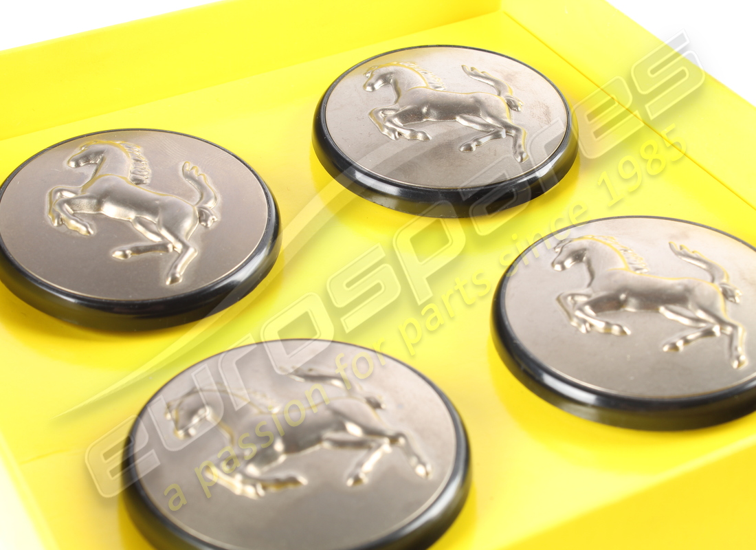 new (other) ferrari set 4 titanium push in hub caps. part number 70001285 (2)