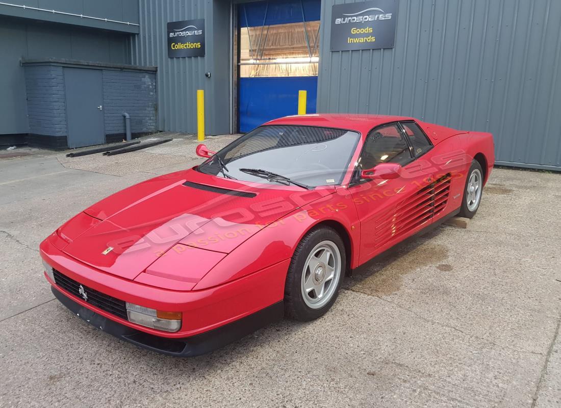 ferrari testarossa (1987) being prepared for dismantling at eurospares